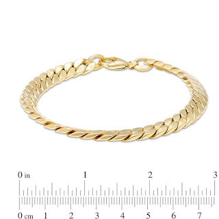 Previously Owned - Italian Gold 7.0mm Flat Curb Chain Link Bracelet in 18K Gold - 7.26"|Peoples Jewellers