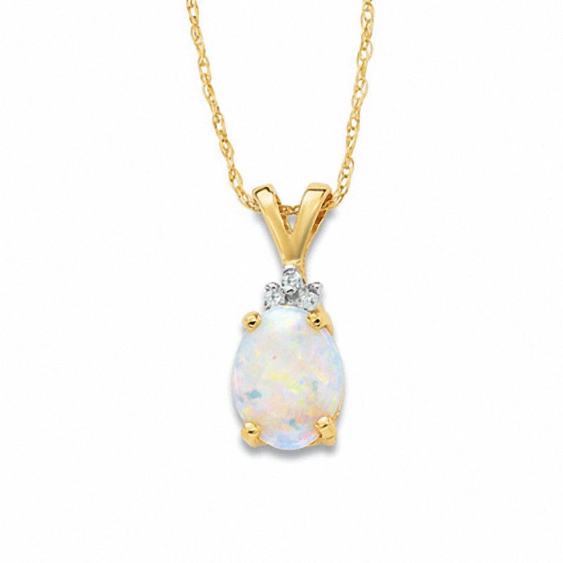 Oval Opal Pendant in 10K Gold with Tri-Top Diamond Accents