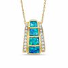 Cabochon Lab-Created Opal Inlay and 0.10 CT. T.W. Diamond Pendant in 10K Gold