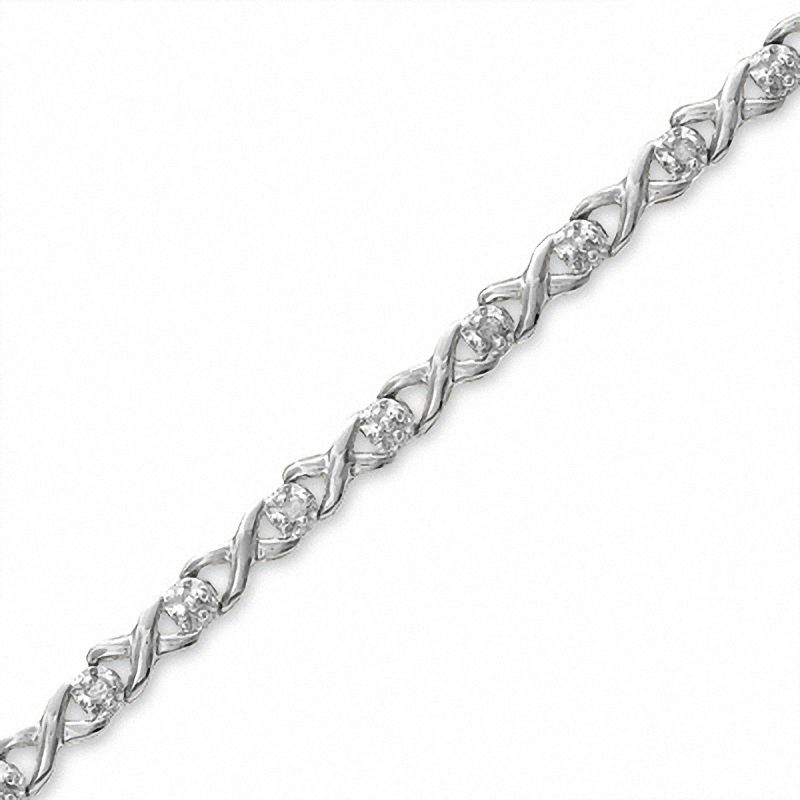 0.12 CT. T.W. Diamond "X" Link Bracelet in 10K White Gold - 7.25"