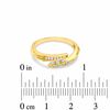 0.18 CT. T.W. Diamond Three Stone Bypass Ring in 10K Gold