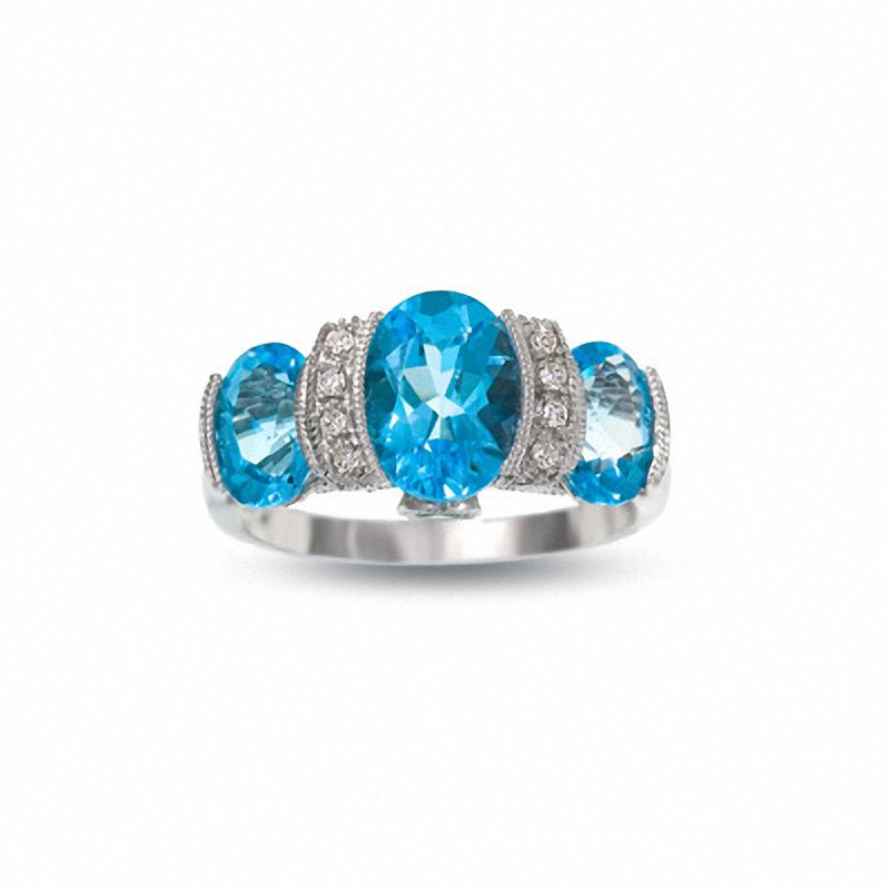 Oval Blue Topaz Three-Stone Ring in 10K White Gold with Diamond Accents|Peoples Jewellers