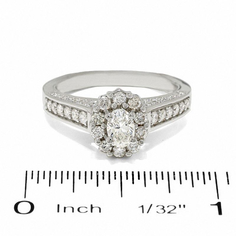 1.00 CT. T.W. Certified Oval Diamond Solitaire Engagement Ring in 14K White Gold