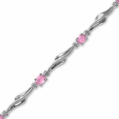 Oval Pink Sapphire Wave Bracelet in 10K White Gold with Diamond Accents