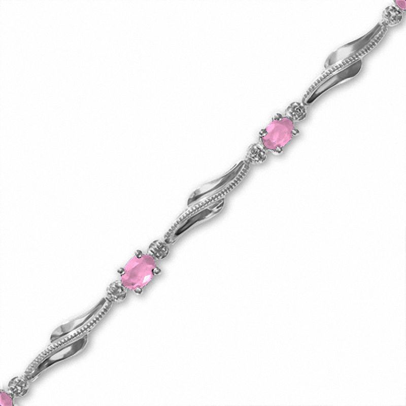 Oval Pink Sapphire Wave Bracelet in 10K White Gold with Diamond Accents