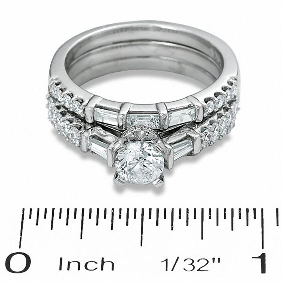 1.50 CT. T.W. Round and Baguette Diamond Three-Piece Bridal Set in 14K White Gold