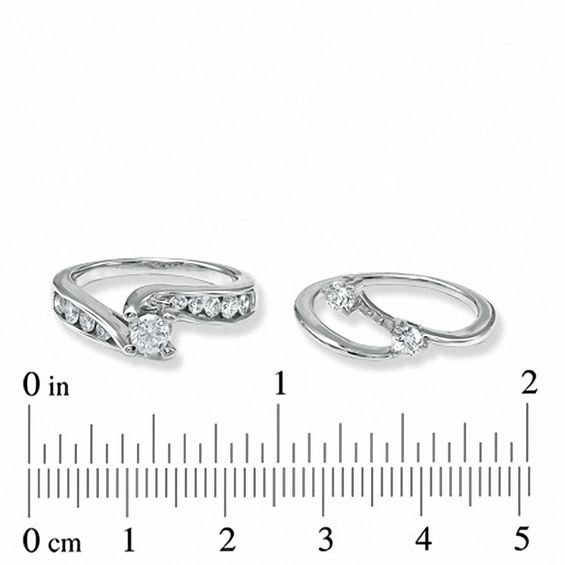 CT. T.W. Diamond Three Stone Bridal Set in 14K Gold