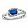 Thumbnail Image 0 of Oval Blue Sapphire and Diamond Accent Ring in 14K White Gold