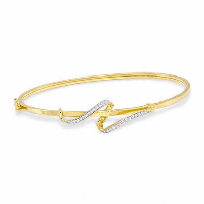 0.21 CT. T.W. Diamond Swirl Bangle in 10K Gold