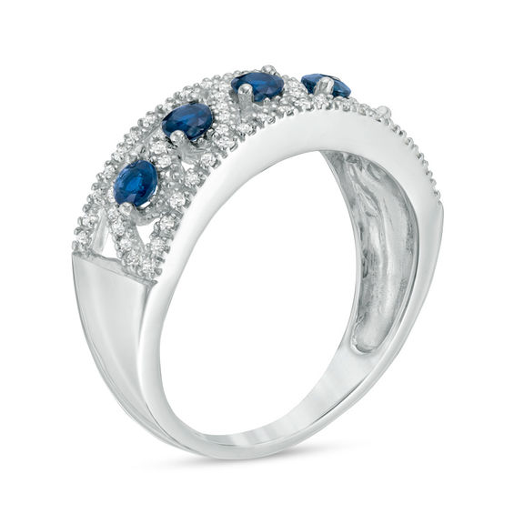 Blue Sapphire and 0.23 CT. T.W. Diamond Band in 10K White Gold