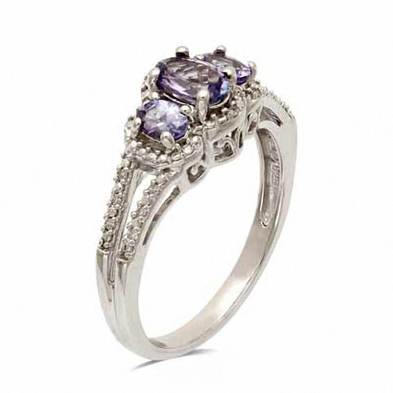 Oval Tanzanite and Diamond Accent Three Stone Ring in Sterling Silver