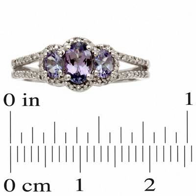 Oval Tanzanite and Diamond Accent Three Stone Ring in Sterling Silver