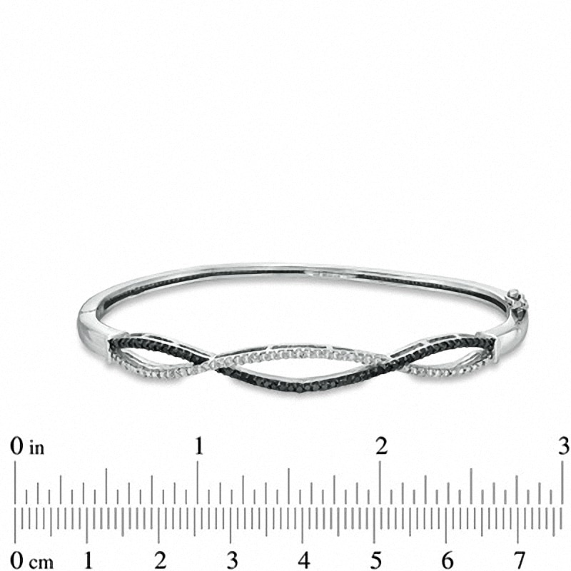 0.50 CT. T.W. Enhanced Black and White Diamond Criss-Cross Bangle in Sterling Silver