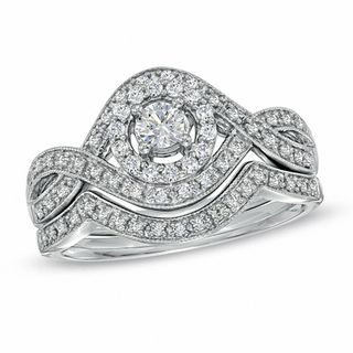 0.50 CT. T.W. Diamond Twist Frame Bridal Set in 14K White Gold