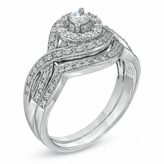 0.50 CT. T.W. Diamond Twist Frame Bridal Set in 14K White Gold