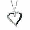 0.33 CT. T.W. Enhanced Black and White Diamond Inside-Out Heart Pendant in 10K White Gold