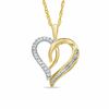 0.16 CT. T.W. Diamond Swirling Heart Pendant in 10K Gold