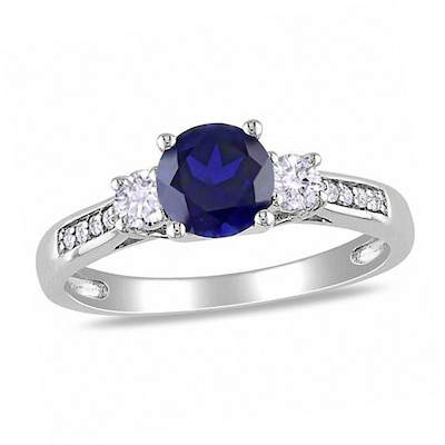 Blue and White Lab-Created Sapphire and 0.05 CT. T.W. Diamond Three Stone Ring in 10K White Gold