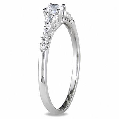 White Lab-Created Sapphire and 0.05 CT. T.W. Diamond Promise Ring in Sterling Silver