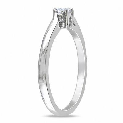 White Lab-Created Sapphire and 0.04 CT. T.W. Diamond Three Stone Promise Ring in Sterling Silver