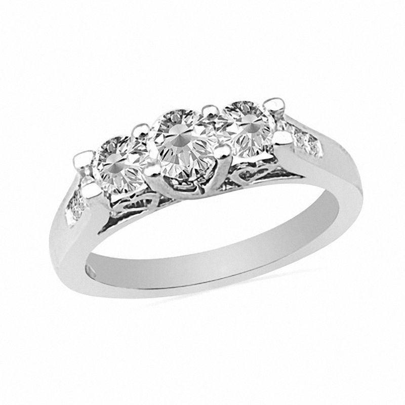 0.50 CT. T.W. Diamond Three Stone Ring with Heart Accents in 10K White Gold|Peoples Jewellers