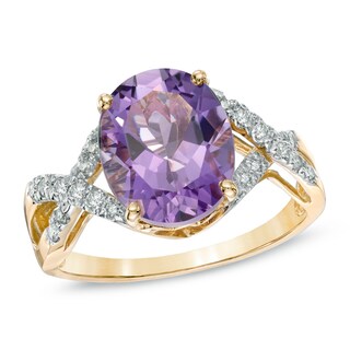 Oval Amethyst and 0.13 CT. T.W. Diamond Ring in 10K Gold