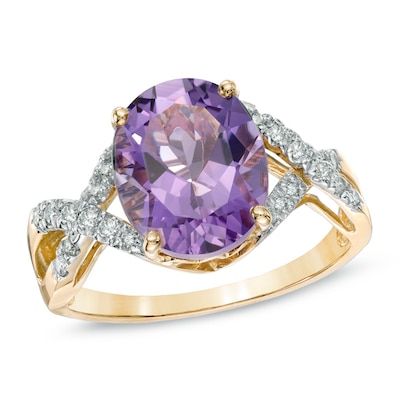 Oval Amethyst and 0.13 CT. T.W. Diamond Ring in 10K Gold