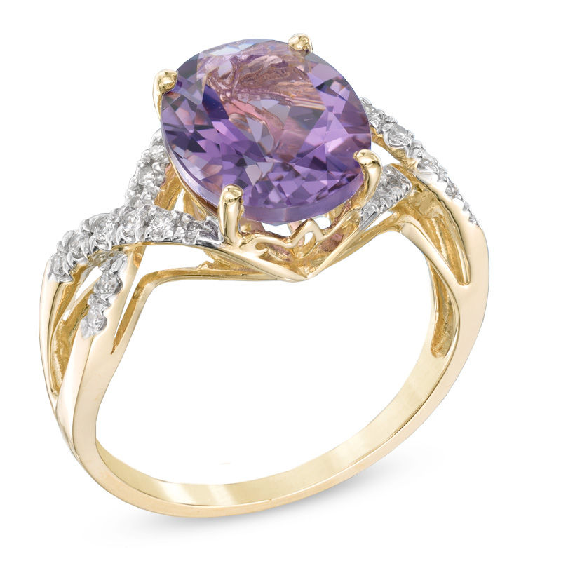 Oval Amethyst and 0.13 CT. T.W. Diamond Ring in 10K Gold