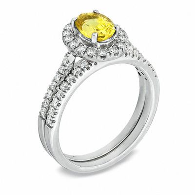 Certified Oval Yellow Sapphire and 0.46 CT. T.W. Diamond Bridal Set in 14K White Gold