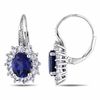 Thumbnail Image 0 of Oval Blue and White Lab-Created Sapphire with Diamond Accent Sunburst Frame Earrings in Sterling Silver