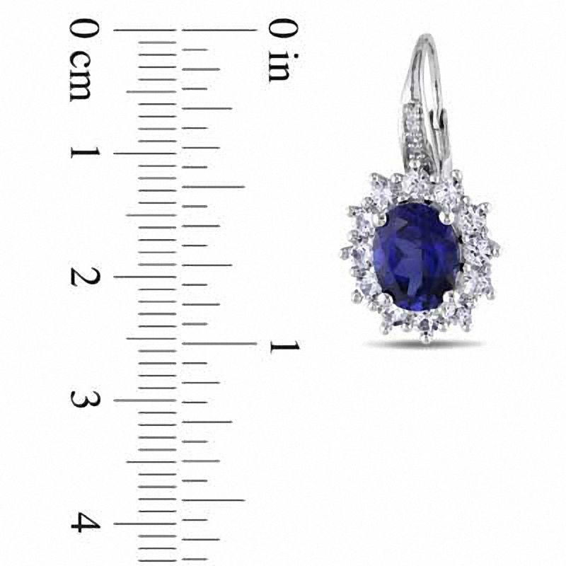 Oval Blue and White Lab-Created Sapphire with Diamond Accent Sunburst Frame Earrings in Sterling Silver