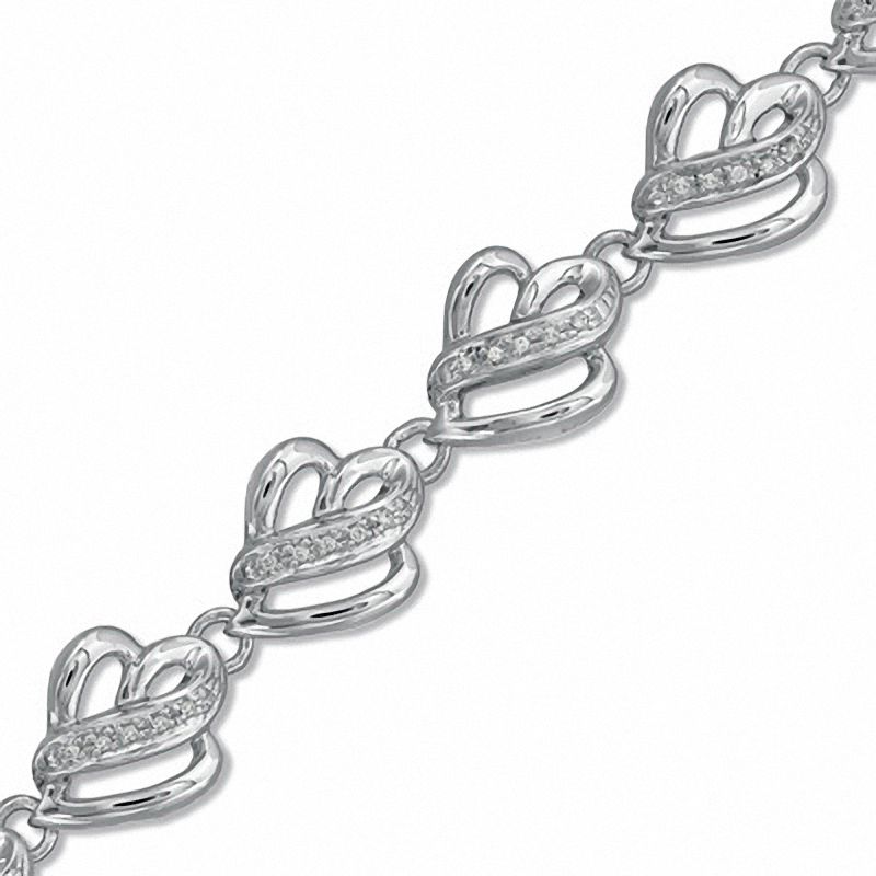 0.25 CT. T.W. Diamond Loop Heart Bracelet in Sterling Silver|Peoples Jewellers