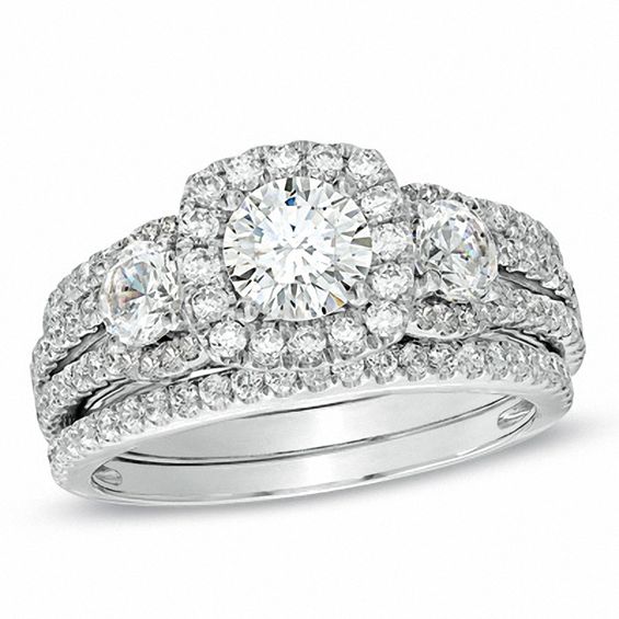 1.54 CT. T.W. Diamond Frame Three Stone Engagement Ring in 14K White Gold