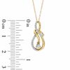 0.10 CT. T.W. Diamond Infinity Symbol Pendant in 10K Gold