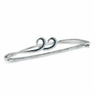 0.33 CT. T.W. Enhanced Blue and White Diamond Twist Bangle in Sterling Silver