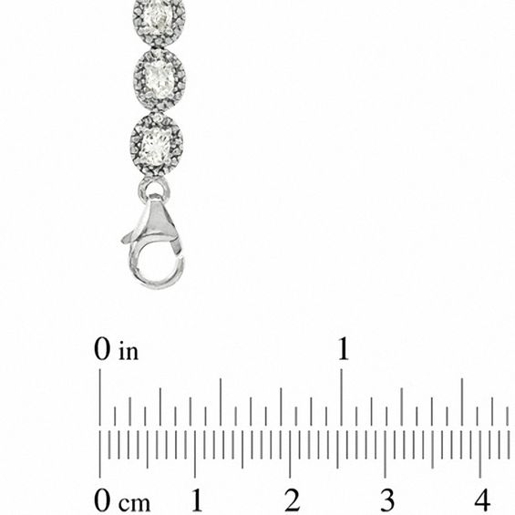 Oval Lab-Created Sapphire and 0.075 CT. T.W. Diamond Bracelet in Sterling Silver