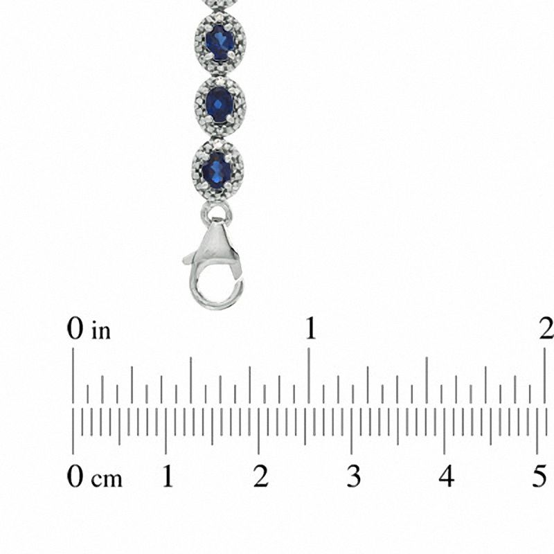 Main Image 3 of Oval Blue Lab-Created Sapphire and 0.075 CT. T.W. Diamond Bracelet in Sterling Silver - 7.5&quot;