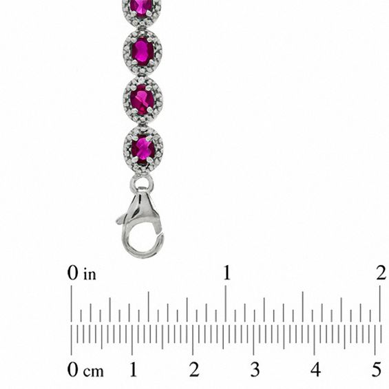 Oval Lab-Created Ruby and 0.075 CT. T.W. Diamond Bracelet in Sterling Silver - 7.5"