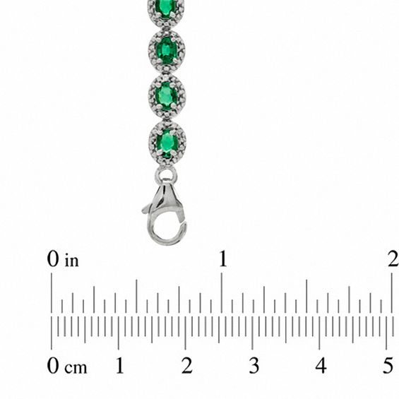 Oval Lab-Created Emerald and 0.075 CT. T.W. Diamond Bracelet in Sterling Silver - 7.5"