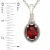Thumbnail Image 1 of Oval Garnet and Lab-Created White Sapphire Pendant and Earrings Set in Sterling Silver