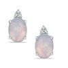 Oval Lab-Created Opal and Diamond Accent Stud Earrings in 10K White Gold