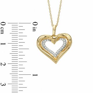 0.10 CT. T.W. Diamond Heart Pendant in 10K Gold