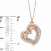 Thumbnail Image 1 of 0.50 CT. T.W. Diamond Tilted Heart Pendant in 10K Rose Gold