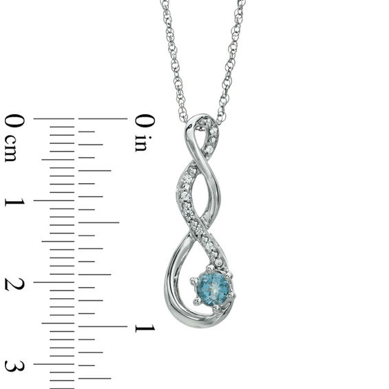 5.5mm Aquamarine and Diamond Accent Twist Pendant in Sterling Silver