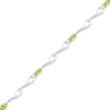 Thumbnail Image 1 of Oval Peridot and Diamond Accent Bracelet in Sterling Silver - 7.5&quot;