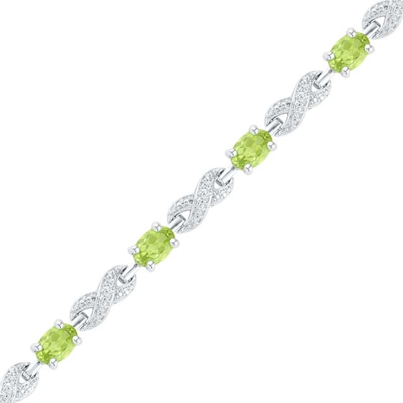 Oval Peridot and 0.10 CT. T.W. Diamond Bracelet in Sterling Silver - 7.5"