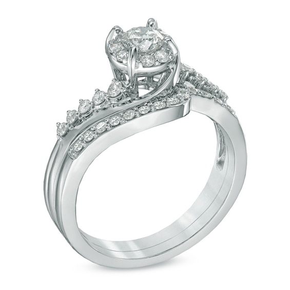 0.72 CT. T.W. Diamond Swirl Bridal Set in 14K White Gold