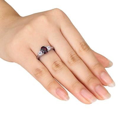 Oval Garnet and White Lab-Created Sapphire Three Stone Ring in Sterling Silver