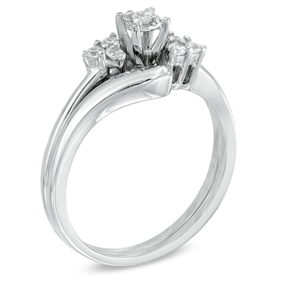 0.16 CT. T.W. Diamond Three Stone Slant Bridal Set in 10K Gold