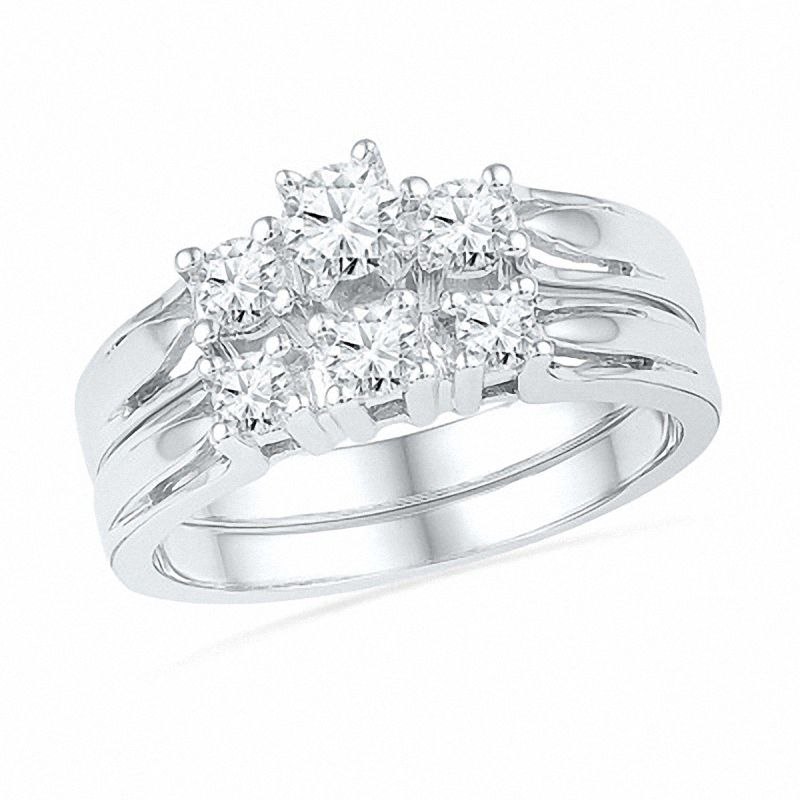 0.63 CT. T.W. Diamond Three Stone Bridal Set in 10K White Gold|Peoples Jewellers